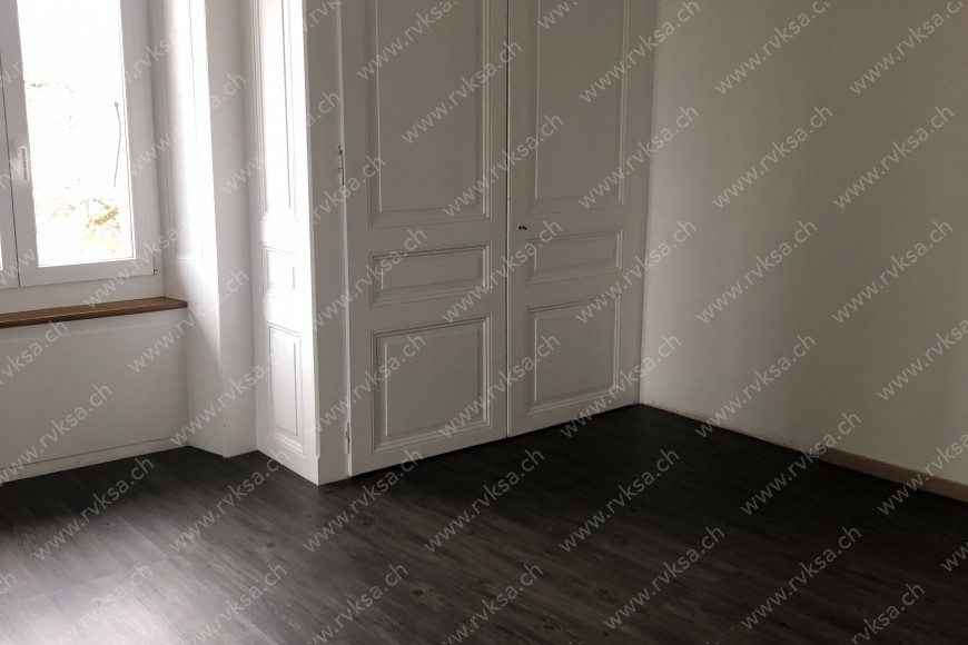 Appartement de 3 pièces, 118.63 m2, à Bôle - Chambre N°1 