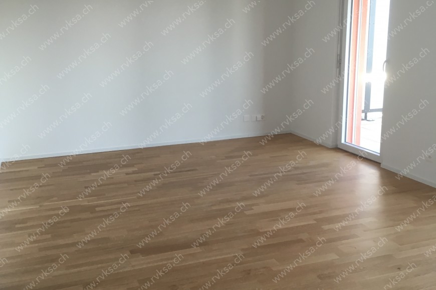 Appartement de 3 pièces, 69.9 m2, à Bôle - Séjour 