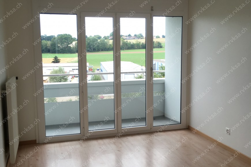 Appartement de 3 pièces, 59 m2, à Cornaux - Séjour 